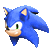 a close up of the head of a blue sonic the hedgehog on a white background .