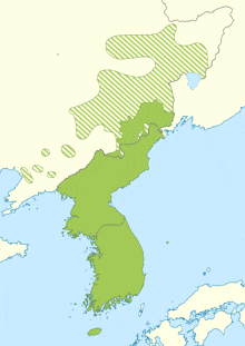 a map of the korean peninsula with a green stripe in the middle