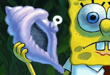 spongebob squarepants is holding a sea shell with a key in it .