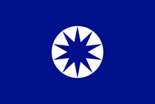 a blue background with a white circle with a star in the middle