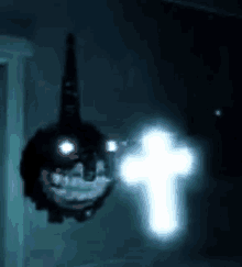 a ghost with a cross in the background is flying through the air in a dark room .