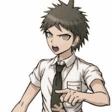 a boy in a school uniform and tie is pointing at something .