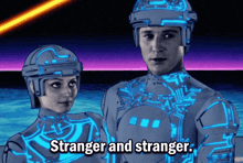 a man and a woman standing next to each other with the words stranger and stranger written below them