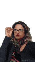 a woman wearing glasses and a scarf is made by unscreen