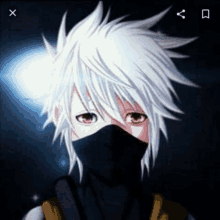 a boy with white hair is wearing a mask on his face .