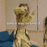 a woman is dancing in a living room with the words baila si eres de luna written on the bottom