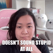 a woman is making a funny face with the caption " doesn 't sound stupid at all "