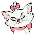 a white cat with a pink bow on its head