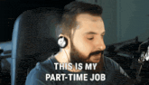 a man wearing headphones says " this is my part time job "