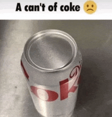 a can 't of coke with a sad face