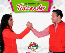 a man and a woman are giving each other a high five under a sign that says " es tiempo de tracender "