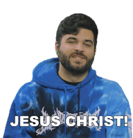 a man wearing a blue tie dye hoodie that says jesus christ on it