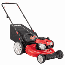 a red and black lawn mower with a black bag that says new holland