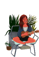 a girl is sitting in a chair playing a guitar