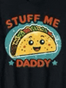 a black t-shirt with a taco that says `` stuff me daddy '' .