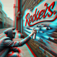 a man spray paints the word rockets on a wall