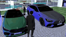 a man in a suit stands in front of a green car and a blue car with a license plate that says aamv