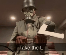 a man in a gas mask is holding an axe and says take the l on the bottom