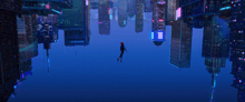 a person is flying through the air in a city