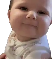 a baby in a white shirt with a unicorn on it