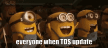 a group of minions with the words everyone when tds update on the bottom