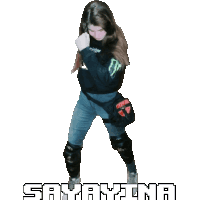 a girl in a monster shirt is standing in front of a sign that says savayina