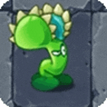 a green cartoon character is sitting on a stone wall in a video game .