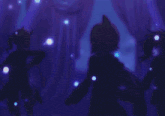 a group of people are dancing in a dark room with purple lights