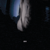 a close up of a man 's face with a countdown of 0:01:12
