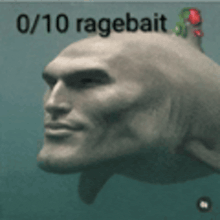 a statue of a man 's head with the words 0/10 ragebait written above it