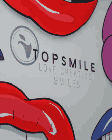 a sign that says top smile love creating smiles on it