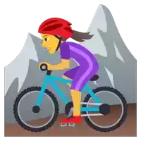 a woman wearing a red helmet is riding a bicycle