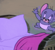 a cartoon mouse is sitting on a bed with purple sheets