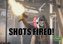 a man is holding a torch with the words shots fired written below him