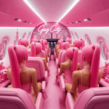 a pink airplane with a neon sign that says gog city