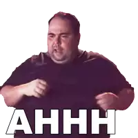 a man in a black shirt is making a funny face with the word ahhh above him