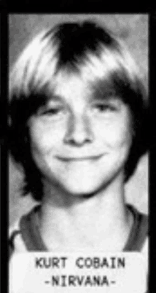 a black and white photo of a young kurt cobain nirvana