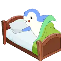 a blue and white penguin is laying on a bed with a green blanket