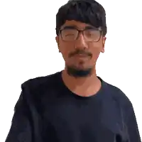 a man with glasses and a beard is making a hand gesture