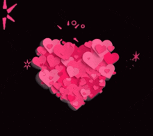 a heart made up of pink hearts with a black background