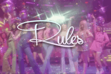 a group of girls are dancing in front of a sign that says " rules "