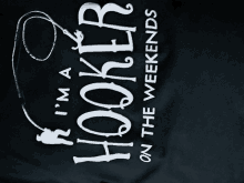 a black shirt that says ' i 'm a hooker on the weekends '