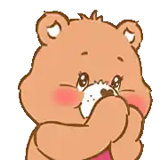 a care bear with a pink heart on its chest is smiling