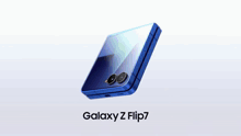 a blue galaxy z flip7 phone is displayed on a white surface