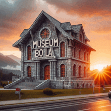 a large stone building with the words museum bola written on it