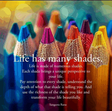 a poster that says life has many shades with a bunch of colored pencils in the background