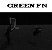 a black and white image of a basketball hoop with the words green fn below it