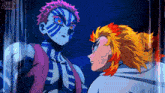 a couple of anime characters standing next to each other with the word demon slayer in the corner