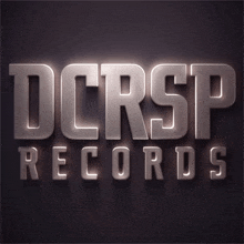 a logo for dcrsp records is lit up in the dark