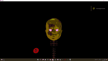 a computer screen shows a gold skull with purple eyes